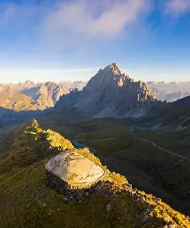 Low Clouds Prints: Aerial view of Rocca la Meja at sunrise with the abandoned bunker of the Alpine Wall