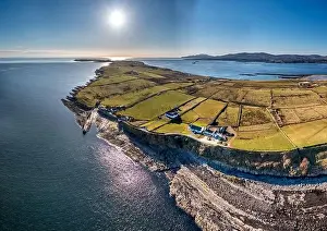 Aerial view of the rocky coast in front of the Ballysaggart Ringfort at St Johns Point in County Donegal - Ireland