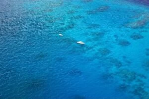 Images Dated 3rd February 2022: Aerial view sailing boat next to reef. Bird eye view, water sport theme. Snorkel excursion