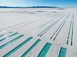 Aerial view of the salt basins in the salt crust of the huge salt flats Salinas Grandes de Jujuy in northern Argentina