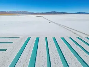 Aerial view of the salt basins in the salt crust of the huge salt flats Salinas Grandes de Jujuy in northern Argentina