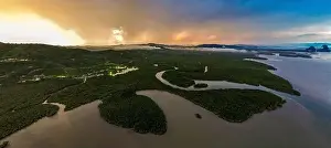 Samet Nangshe Prints: Aerial view of Samet Nangshe Viewpoint at sunset during rainy season, Phang Nga, Thailand