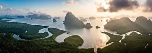 Samet Nangshe Prints: Aerial view of Samet Nangshe Viewpoint at sunset during rainy season, Phang Nga, Thailand