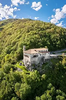 Seriana Valley Prints: Aerial view of the San Patrizio sanctuary on a hill overlooking Casnigo and Valle Seriana