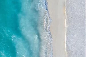 Images Dated 22nd May 2019: Aerial view of sandy beach and ocean with waves. Beautiful tropical white empty beach