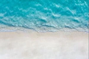 Images Dated 22nd May 2019: Aerial view of sandy beach and ocean with waves. Summer seascape from air. Top view from drone
