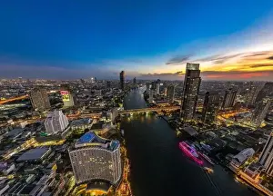 Sathorn Prints: Aerial view of Saphan Taksin district near the Taksin bridge and Chao Phraya river