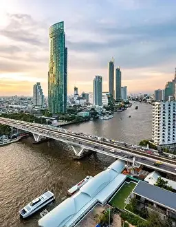 Sathorn Prints: Aerial view of Saphan Taksin district near the Taksin bridge and Chao Phraya river