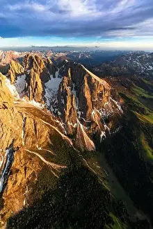Aerial view of Sassopiatto group and Cinque Dita sharp mountains at sunset, Dolomites, South Tyrol, Italy, Europe