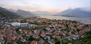 AERIAL VIEW. Scenic picture, postcard view from the lake of a little old village in Lombardy