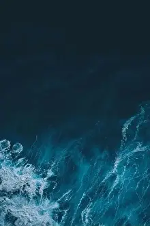 Turbulence Prints: Aerial view to sea landscape, water with waves and rocks
