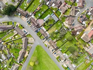 Neighbors Prints: aerial top down view of mostly semi detached houses seen in a typical English village