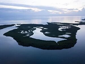 Images Dated 11th September 2017: An aerial view shows extensive mangroves in Turneffe Atoll off the coast of Belize