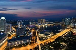 Images Dated 26th February 2017: Aerial view of Singapore business district and city at night in Singapore, Asia