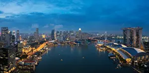 Aerial view of Singapore business district and city at night in Singapore, Asia