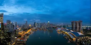Aerial view of Singapore business district and city at night in Singapore, Asia