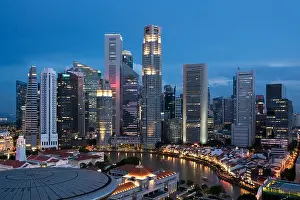 Aerial view of Singapore business district and city at night in Singapore, Asia