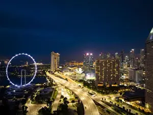 Aerial view of Singapore business district and city at twilight in Singapore, Asia
