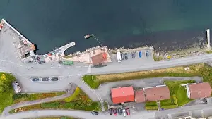 Transportation System Prints: Aerial view of a small coastal village featuring a harbor