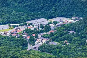 Off Season Prints: Aerial view of small mountain resort town and empty parking lots in off season