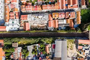 Aerial view of a small residential district in Lisbon outskirt along a railway, Marvila neighbourhood, Lisbon, Portugal