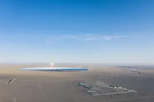 Aerial view of solar thermal power station and transformer substation on desert