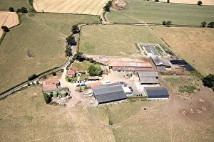 Essex Prints: Aerial view south west of farm Romford Essex RM4 England UK High level oblique