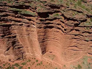 Overland Prints: Aerial view of the stunning, reddish landscape of Ischigualasto Provincial Park in San Juan Province
