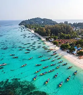 Sunrise Beach Prints: Aerial view of Sunrise beach with long tail boats in Koh Lipe, Satun, Thailand