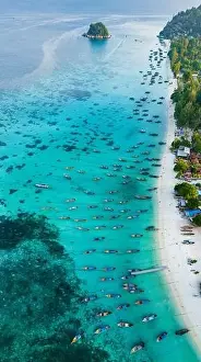 Sunrise Beach Prints: Aerial view of Sunrise beach with long tail boats in Koh Lipe, Satun, Thailand