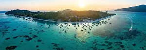 Sunrise Beach Prints: Aerial view of Sunrise beach with long tail boats in Koh Lipe, Satun, Thailand
