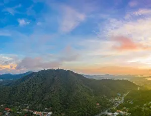 aerial view sunrise in Chalong sea Phuket big Buddha is on the top of Nakkerd mountain