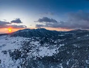 The Aerial view of a sunset over mountain in Arahova