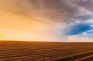 Aerial View Of Sunset Sunrise Bright Sky Above Summer Hay Field Landscape In Evening