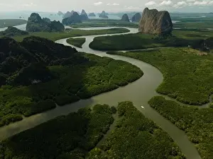 Phang Prints: Aerial view of a swerving river through a series of limestones in Phang Nga Bay