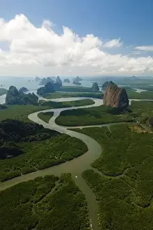 Phang Prints: Aerial view of a swerving river through a series of limestones in Phang Nga Bay