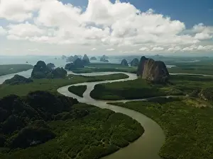 Phang Prints: Aerial view of a swerving river through a series of limestones in Phang Nga Bay