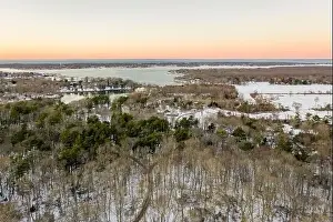 Shelter Island Prints: Aerial view of Sylvester Manor and Dering Harbor in the distance