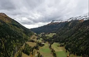 Mountain Pass Prints: An aerial view of the Tamina Valley in late autumn with the first snow on the mountain tops