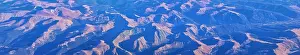 Panorama Mountain Prints: Aerial view of topographical Rocky Mountain landscapes on flight over Colorado and Utah during autumn