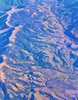 Panorama Mountain Prints: Aerial view of topographical Rocky Mountain landscapes on flight over Colorado and Utah during autumn