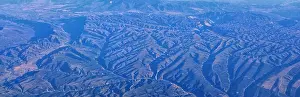 Panorama Mountain Prints: Aerial view of topographical Rocky Mountain landscapes on flight over Colorado and Utah during autumn