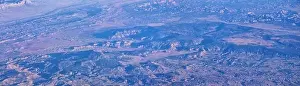 Valley Spring Prints: Aerial view of topographical Rocky Mountain landscapes on flight over Colorado and Utah during autumn