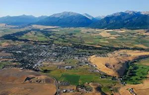 Valley Mountains Prints: Aerial view of the town of Enterprise and the Wallowa Mountains, Oregon