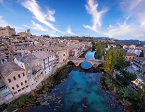 Stone Town Prints: Aerial view of the town of Valderrobres with its bridge and its castle at sunset in Teruel