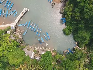 Baron Prints: Top aerial view of traditional boats in lagoon beach in Indonesia