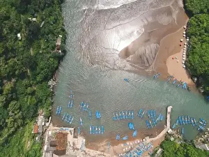 Baron Prints: Top aerial view of traditional boats in lagoon beach in Indonesia