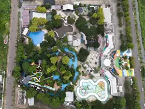Waterpark Prints: Aerial view of Transera Waterpark Harapan Indah swimming pool at Bekasi