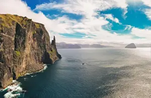 Sandavagur Prints: Aerial view of Trollkonufingur, also called The Witch's Finger on Faroe Islands