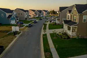 Middle Class Prints: Aerial view of typical American new construction neighborhood street in Maryland for the upper middle class